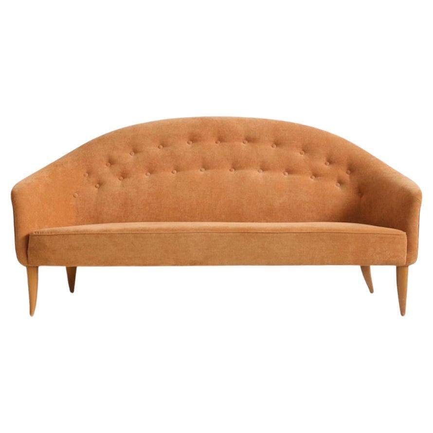 Canapé Paradise with orange fabric upholstery by Kerstin Hörlin-Holmqvist
