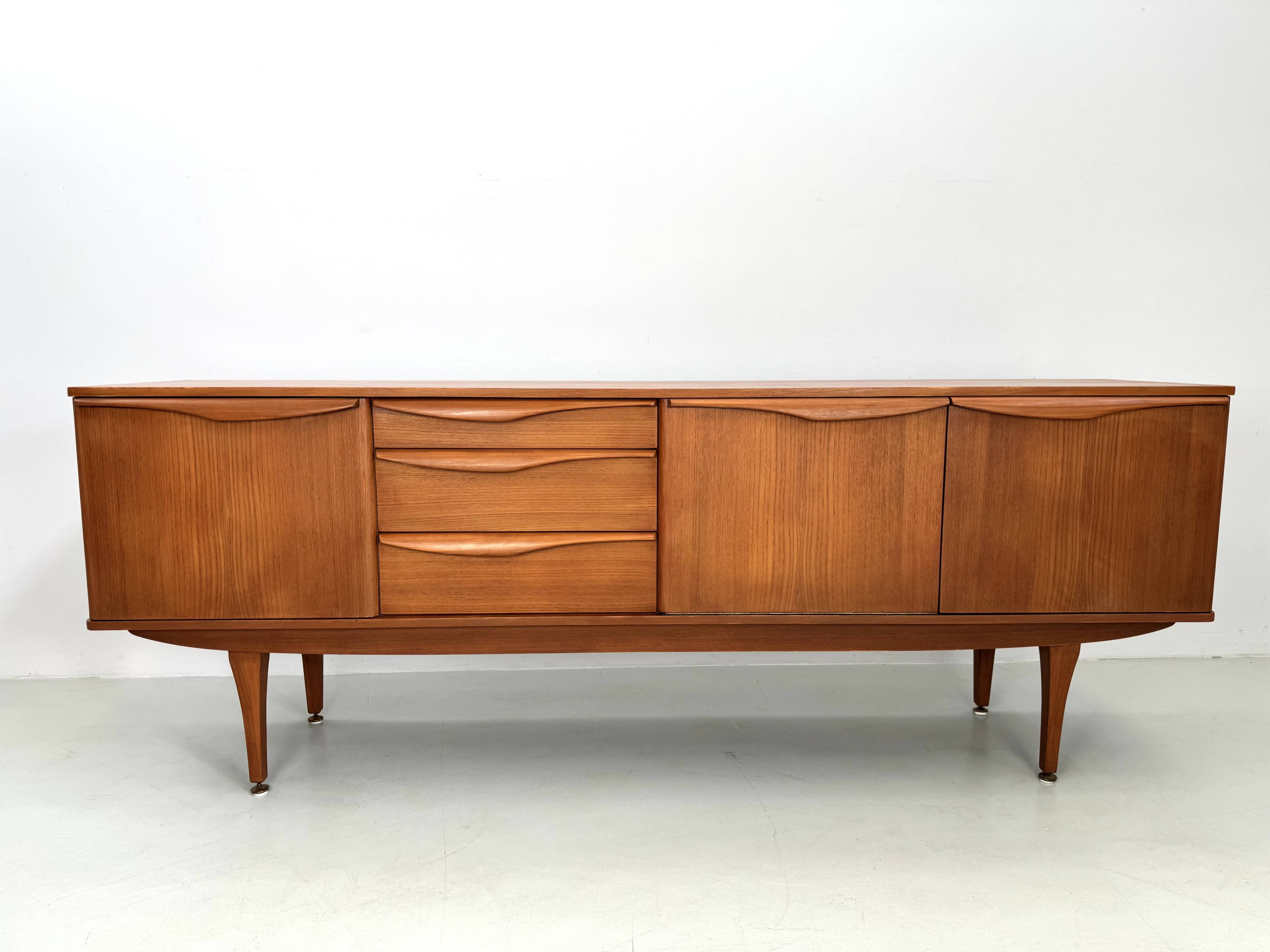 Beautiful and unique Stonehill sideboard from the 1960s made of teak wood.