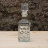 Carafe en verre ciselé
