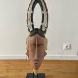 African wooden mask to pose