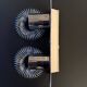 Double "spring" wall light Andréa Lazzari. Vintage.