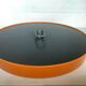 Old vintage orange round mirror