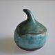Signature ceramic fish-covered pot to identify.