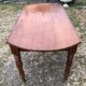 Louis Philippe oval drop-leaf table in solid cherry wood with 2 drawers.