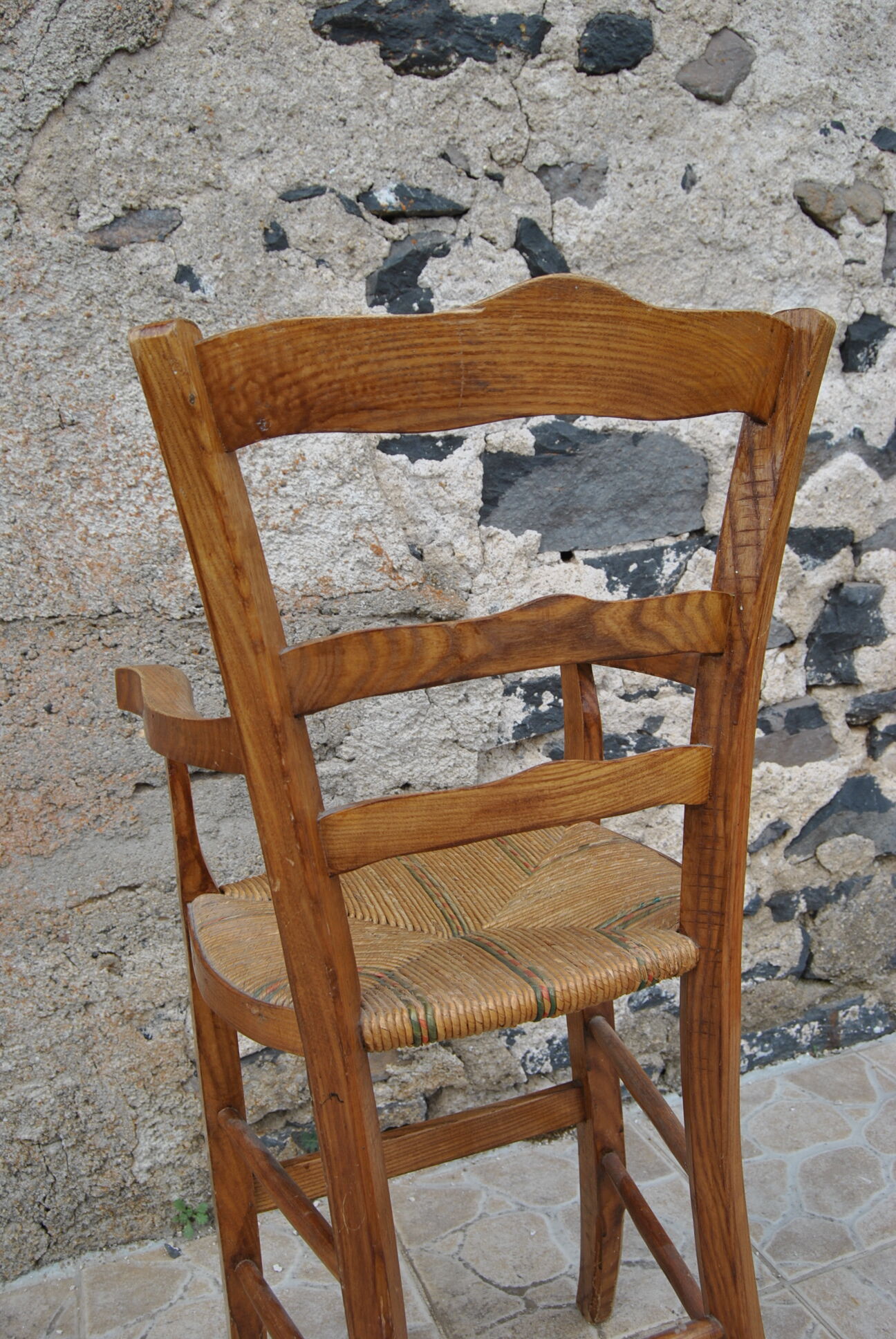 Wooden children's high chair and mulched seat