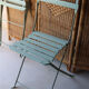 6 antique folding garden chairs made of painted wood and metal.