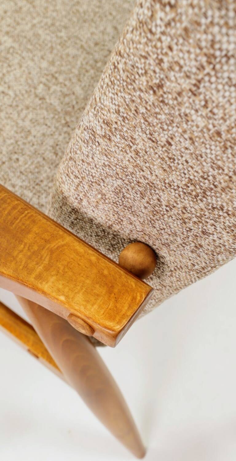 Fauteuil scandinave en tissu tressé beige