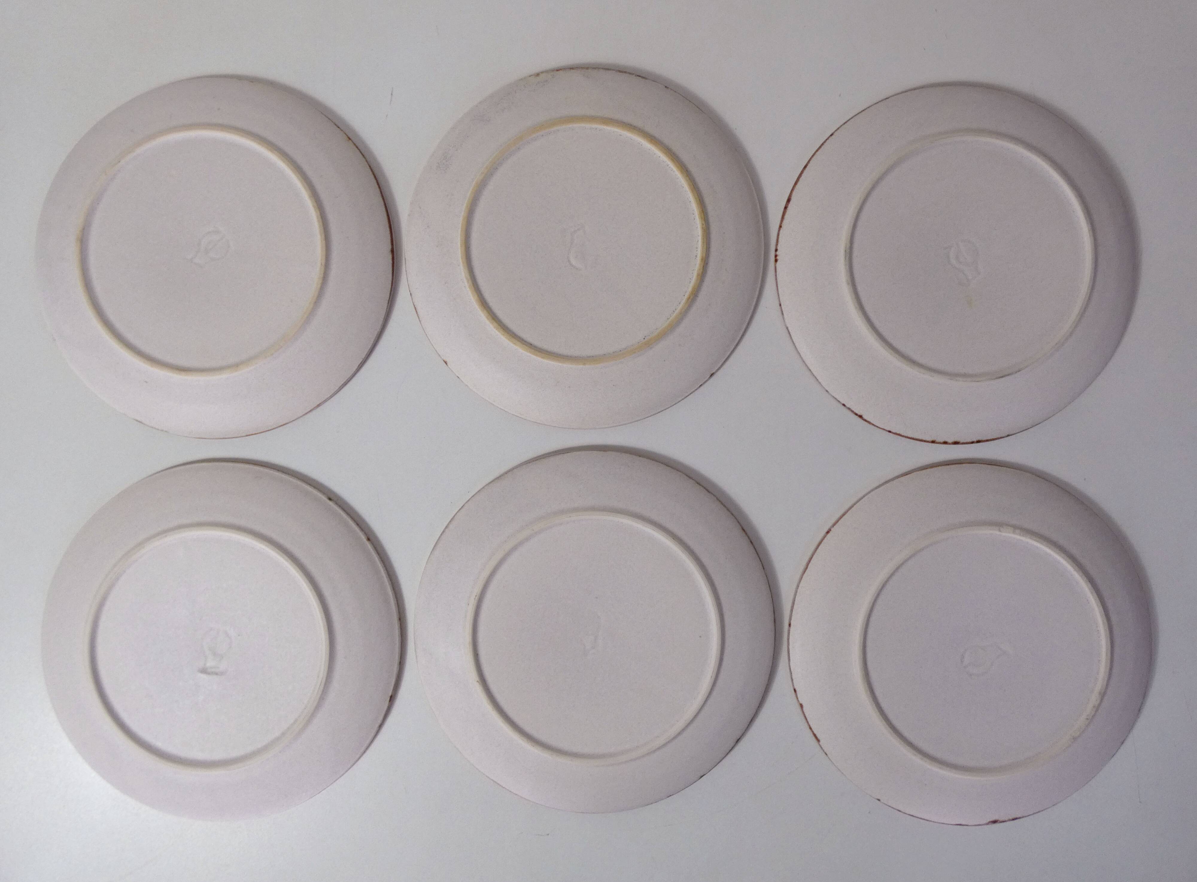 6 signed stoneware dinner plates