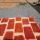 Large Moroccan Berber rug in orange and ecru wool, 400 x 300 cm.
