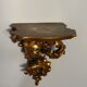 19th century wall console in gilded carved wood
