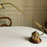 Old brass articulated lamp