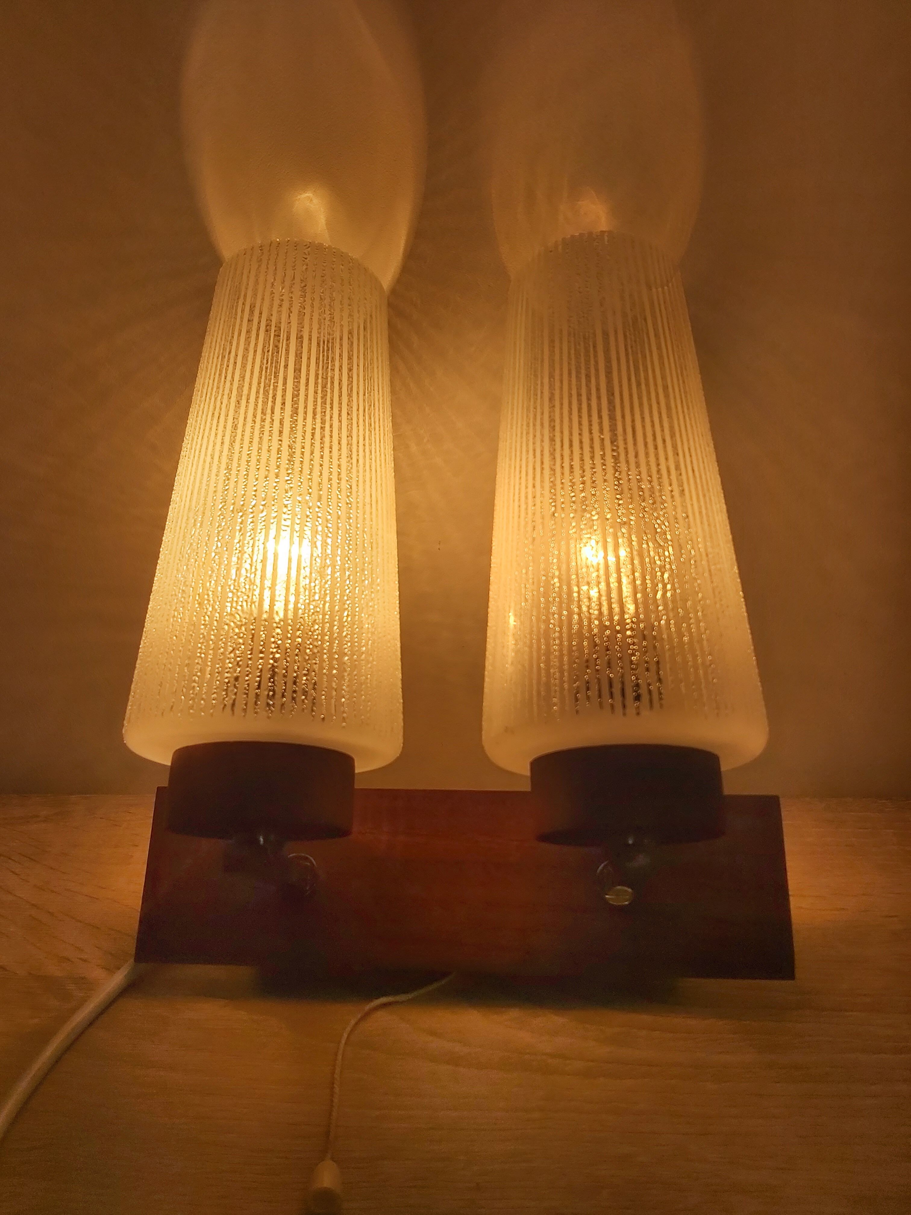 Wall lamp in teak wood and glass