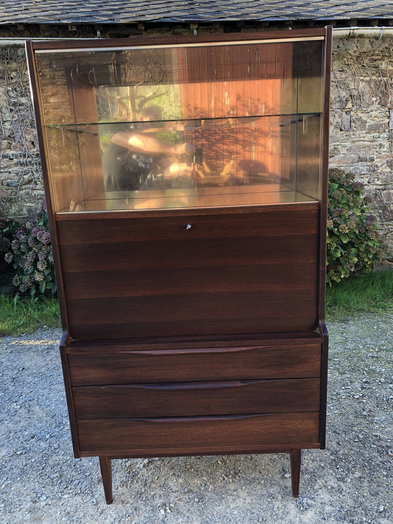 Vintage Scandinavian secretary in rosewood with drawers featuring fin-style handles.