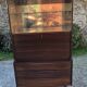 Vintage Scandinavian secretary in rosewood with drawers featuring fin-style handles.