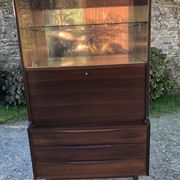 Vintage Scandinavian secretary in rosewood with drawers featuring fin-style handles.