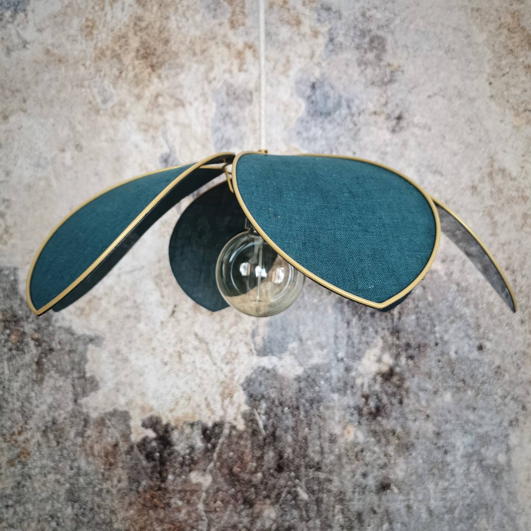 Flower suspension with metal structure and peacock blue linen petals