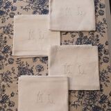 7 napkins with embroidered initials ML