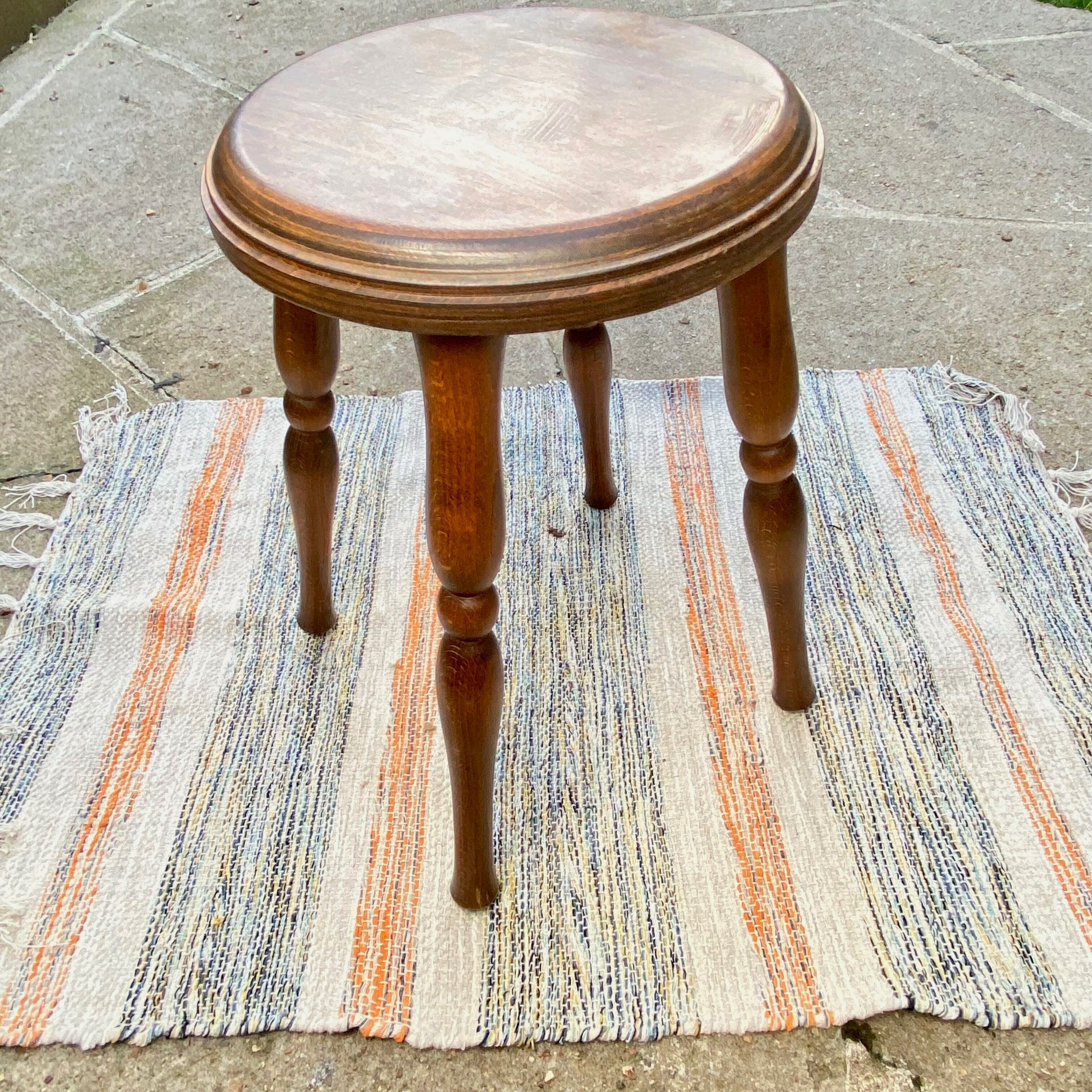 Vintage stool with turned wooden legs