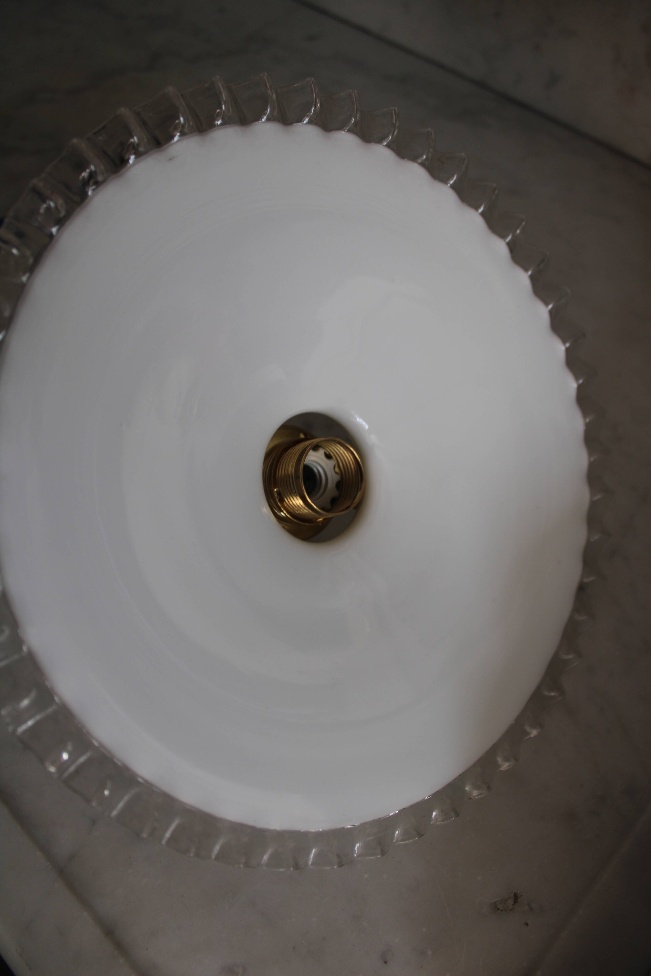 Dented opaline suspension