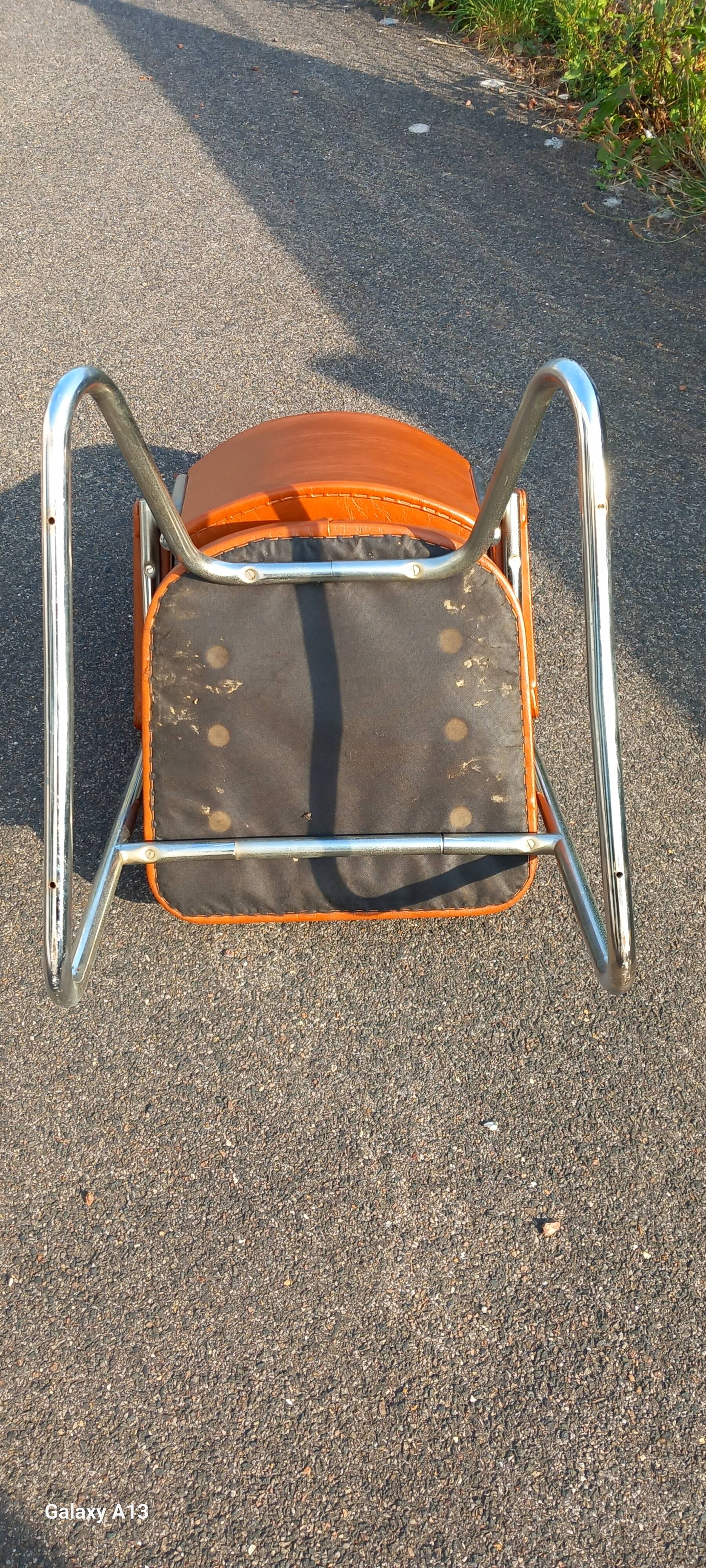 Vintage leatherette and chrome armchair