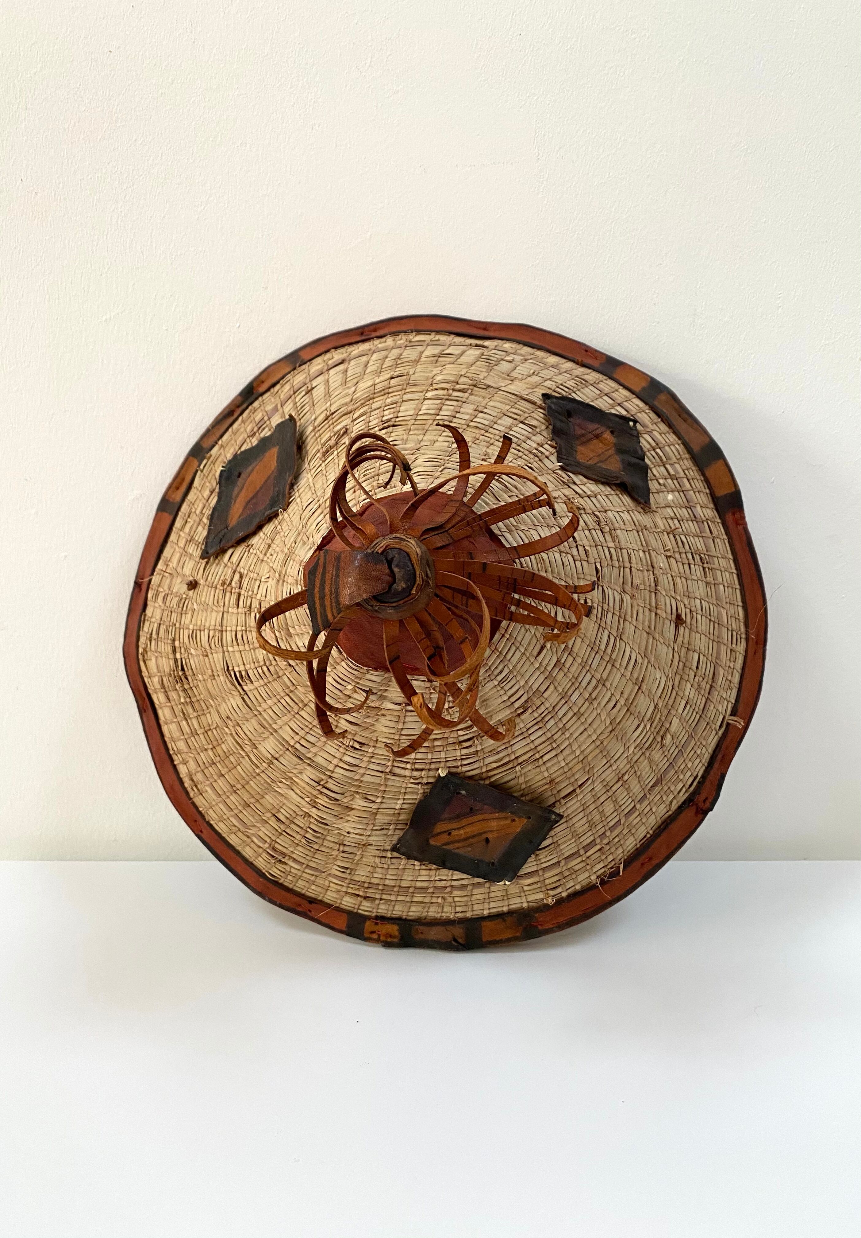 Traditional African Fulani hat in leather and woven straw
