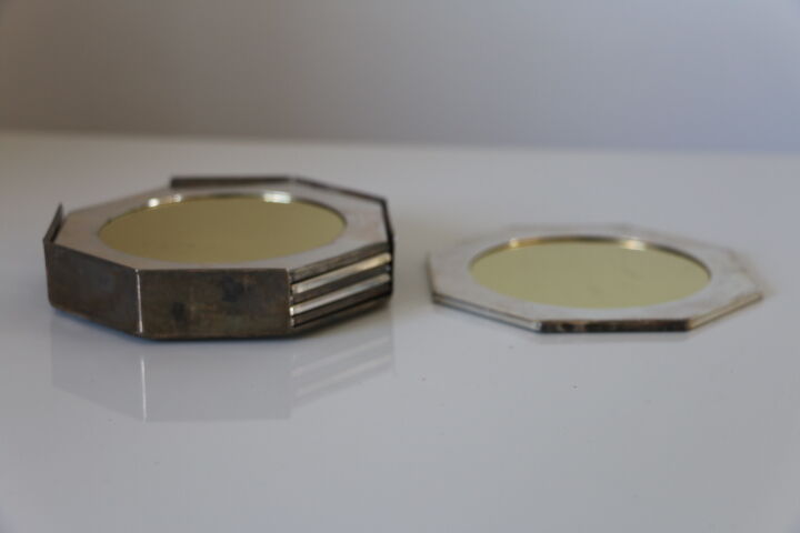 6 metal coasters and art deco mirror