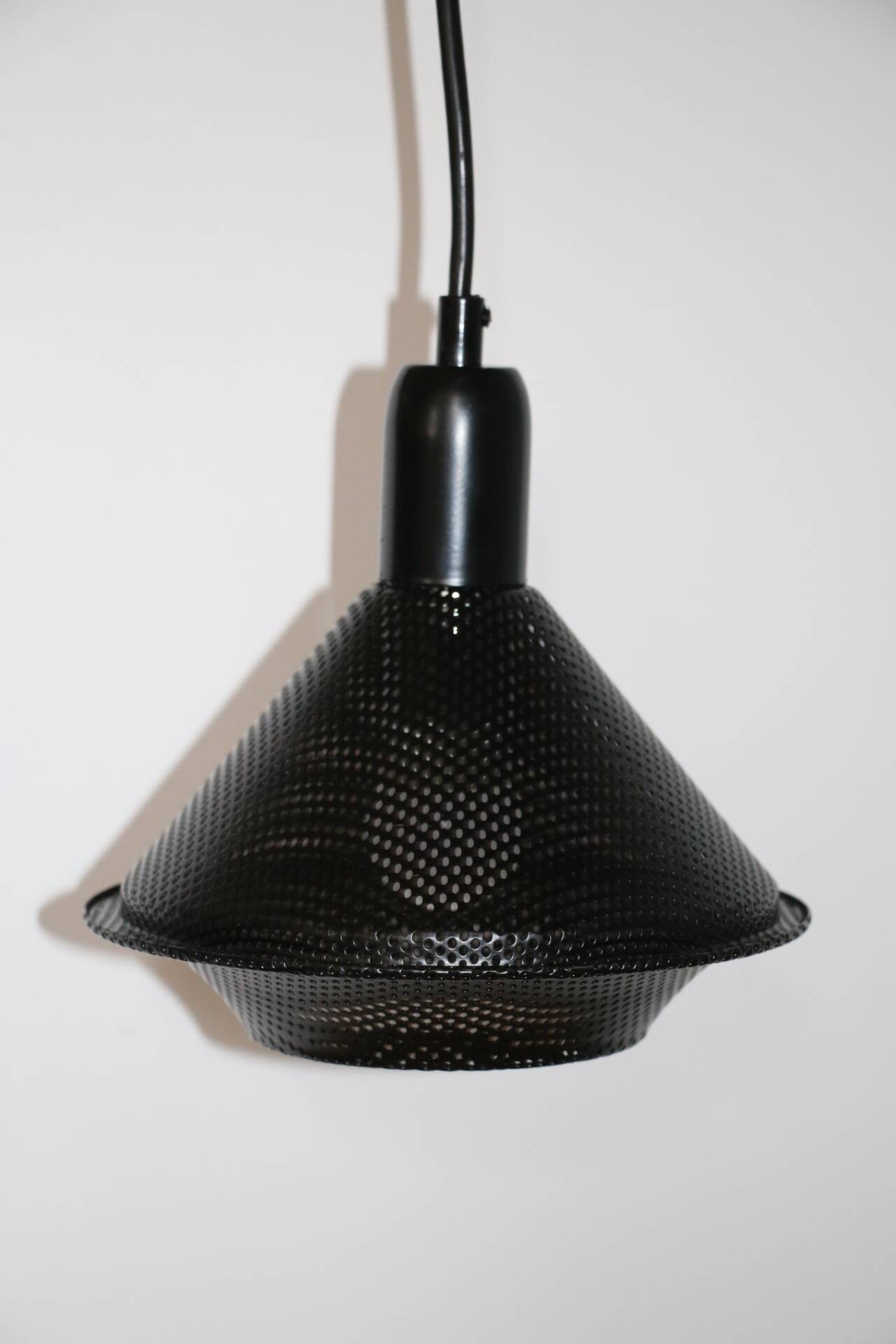 Perforated metal suspension 1980