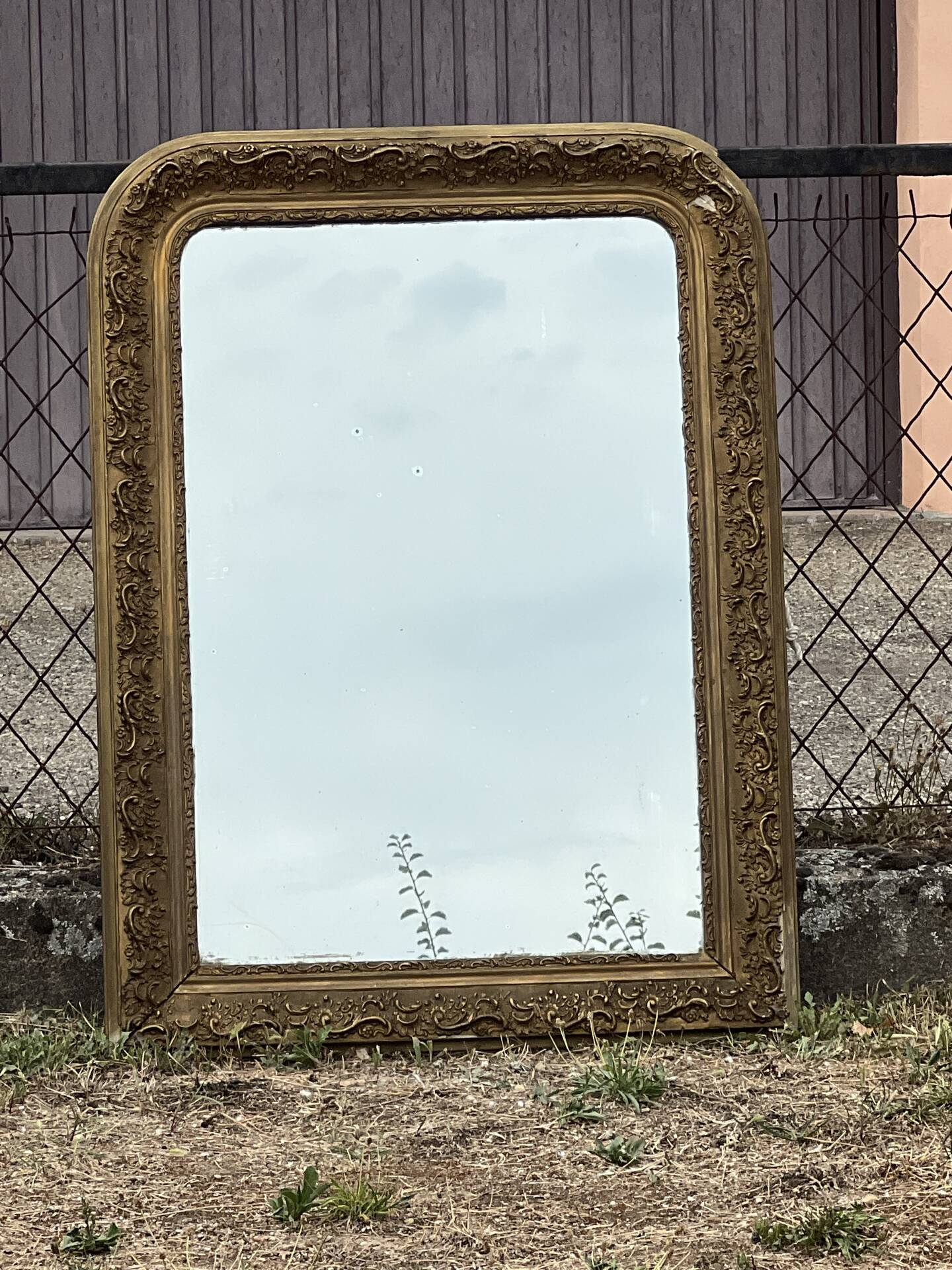 Large gilded sculpted Louis-Philippe mirror, mercury 104x77cm