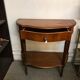 Cherry half-moon console with drawer and bottom shelf