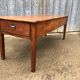 Antique farmhouse table in solid cherry wood with 3 drawers and 1 pull-out.
