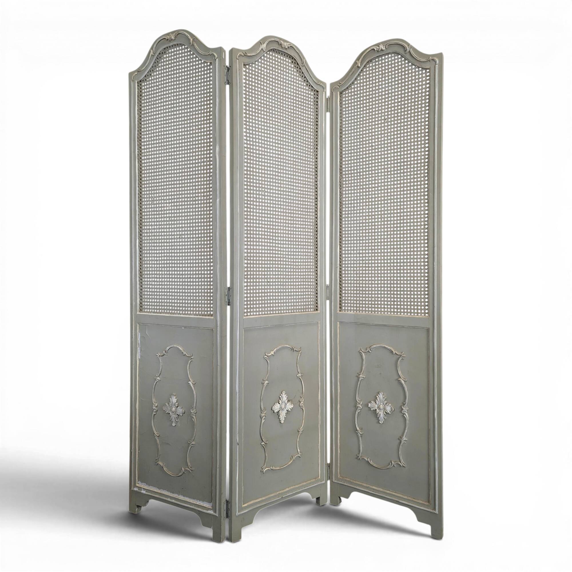 Louis XVI style caned screen with a re-champis finish.