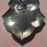 Gilded brass leaf pocket emptier