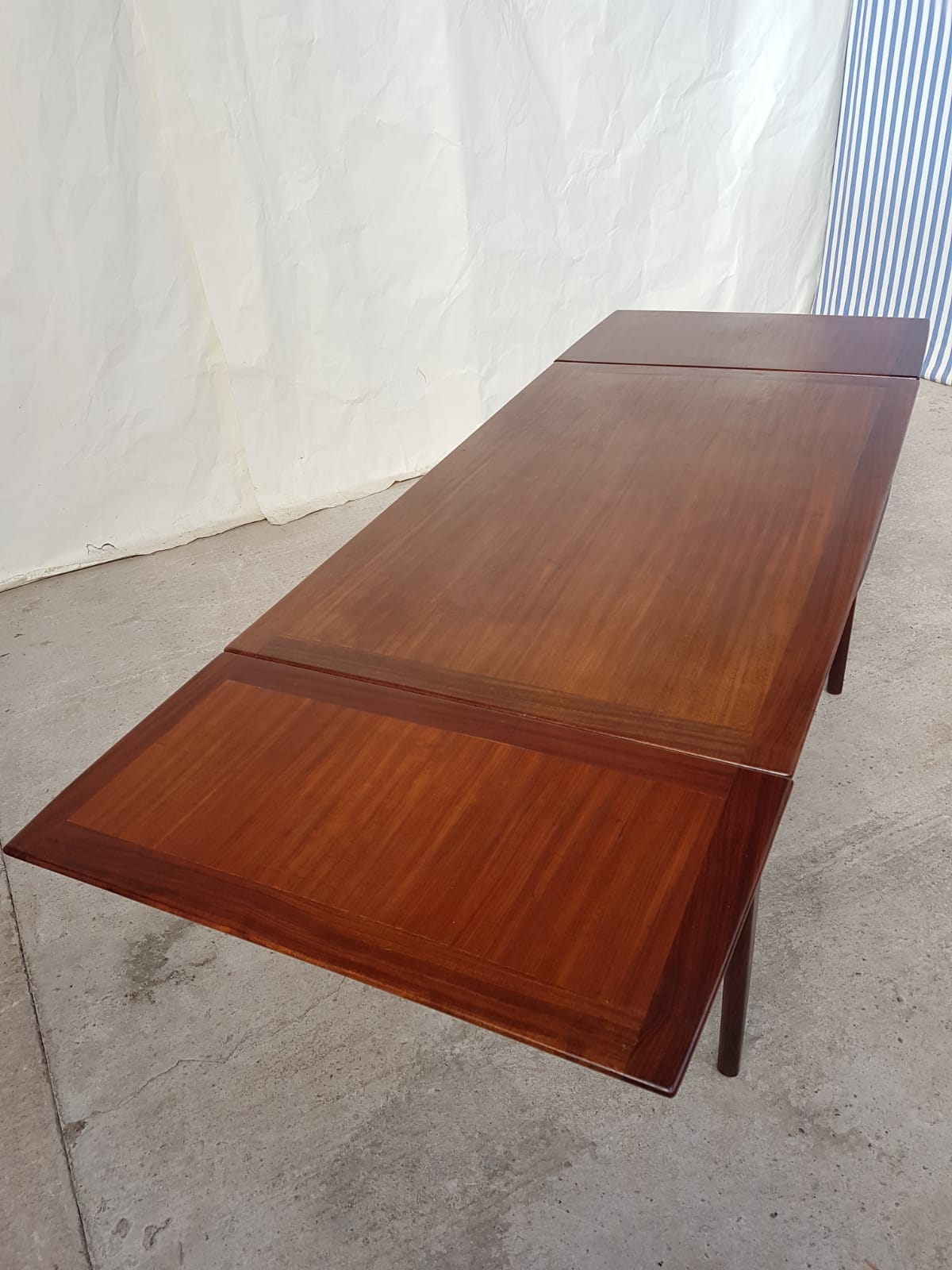 Teak extending dining table by Younger