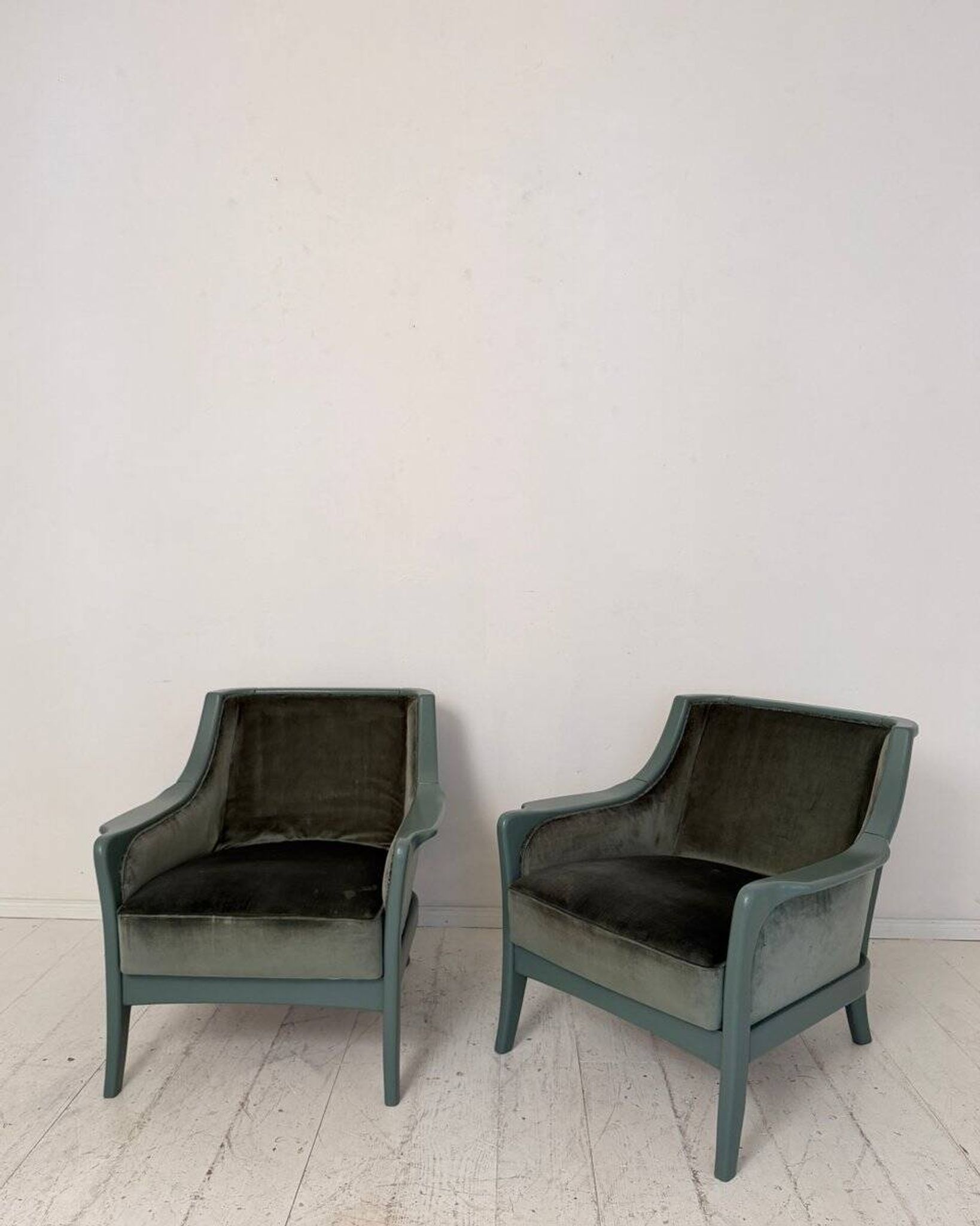 Pair Lounge Chairs in green velvet and lacquered wood, France, 1950