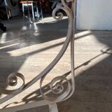 Old wrought iron cradle painted