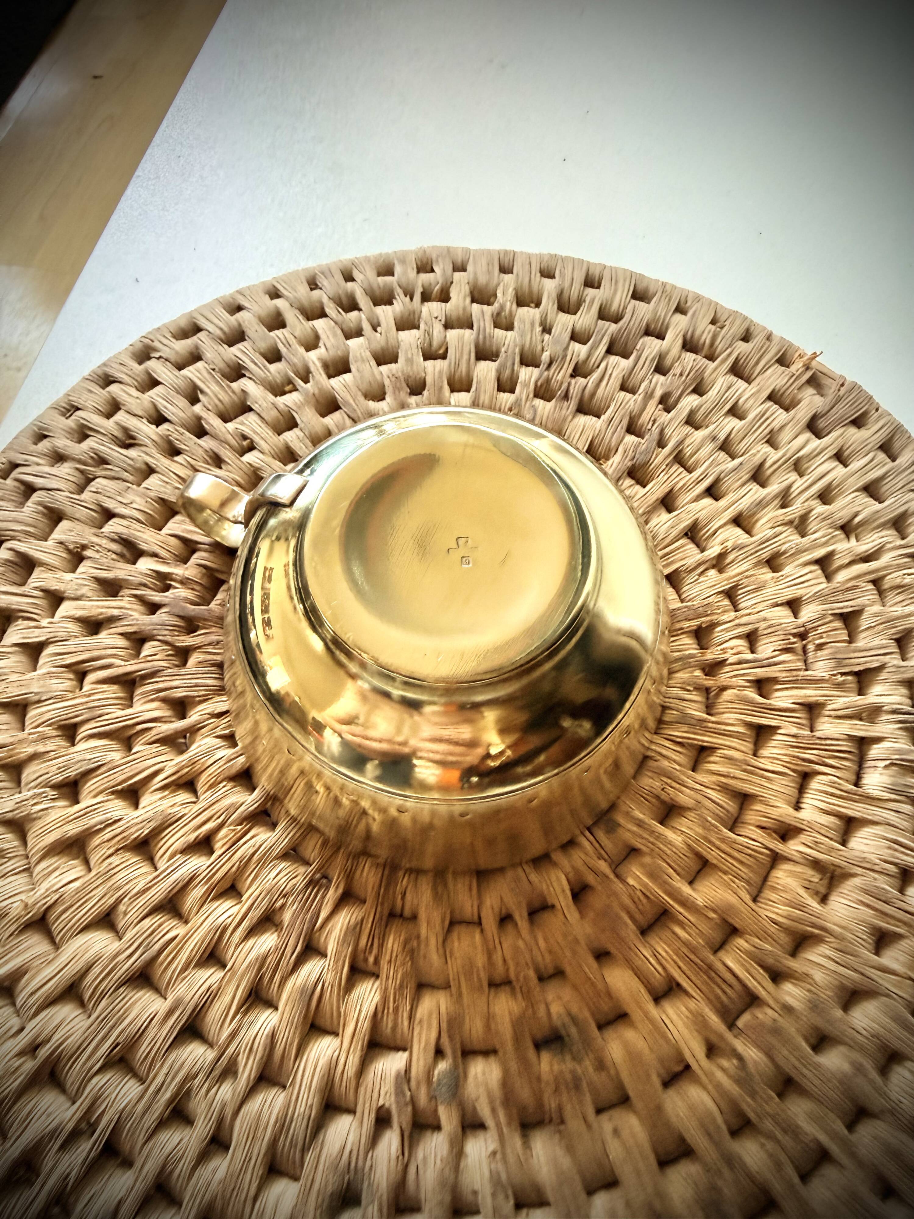 Cup and saucer in brass Saint Médard (18th century)