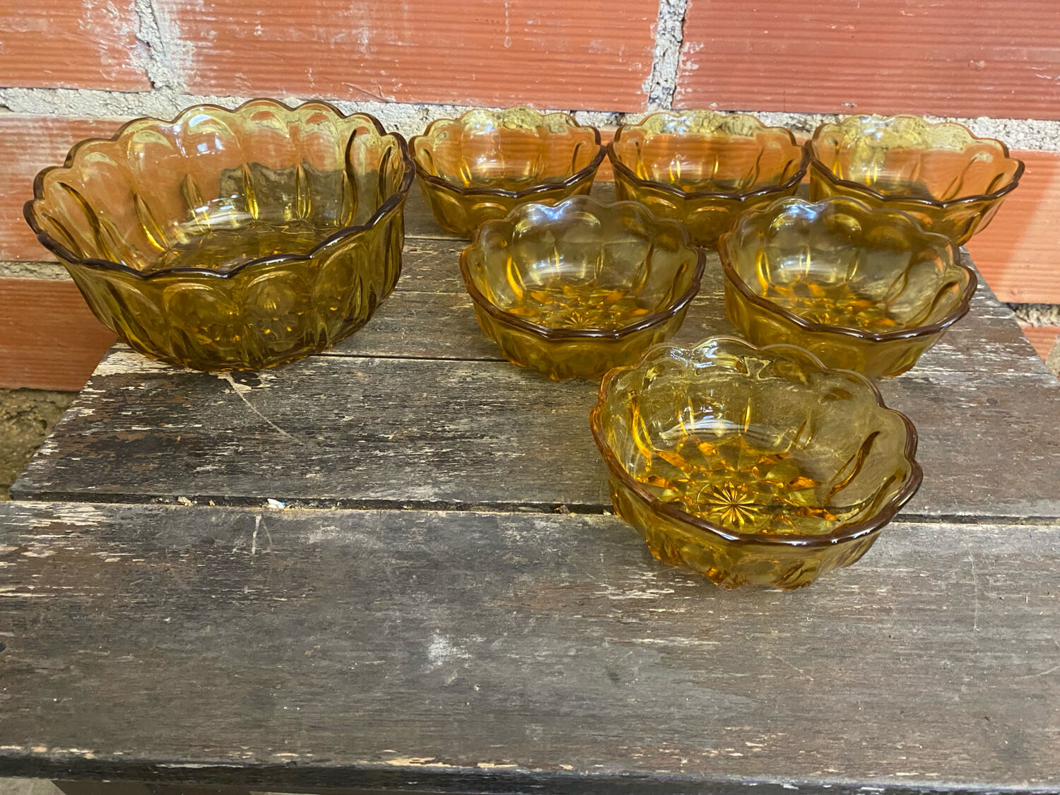 Salad bowl + 6 vintage amber orange moulded glass bowls from the 1970s.