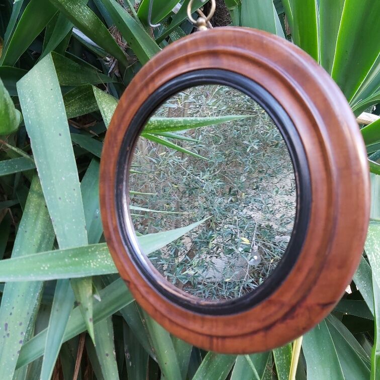 Old wooden round mirror