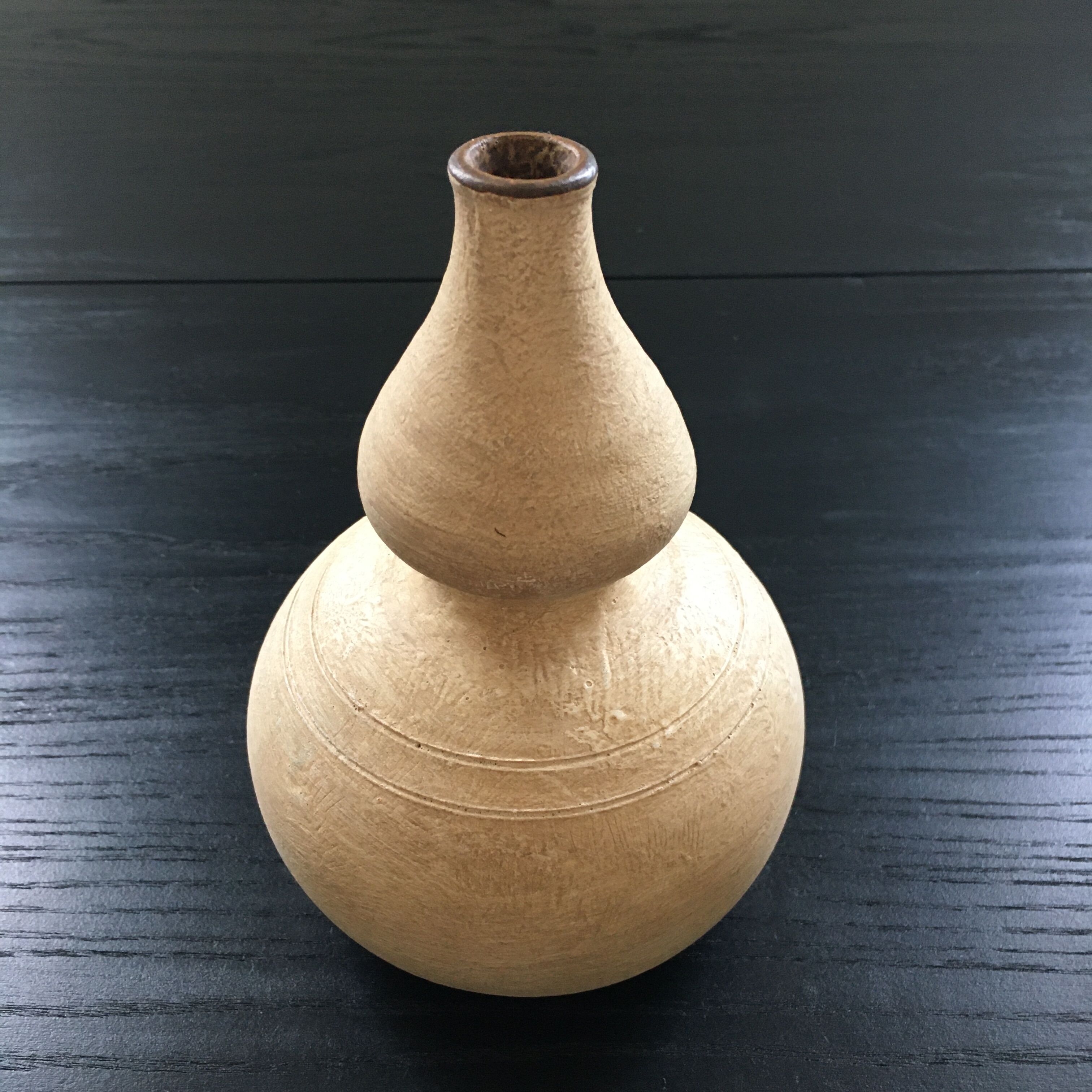 Trio of terracotta vases