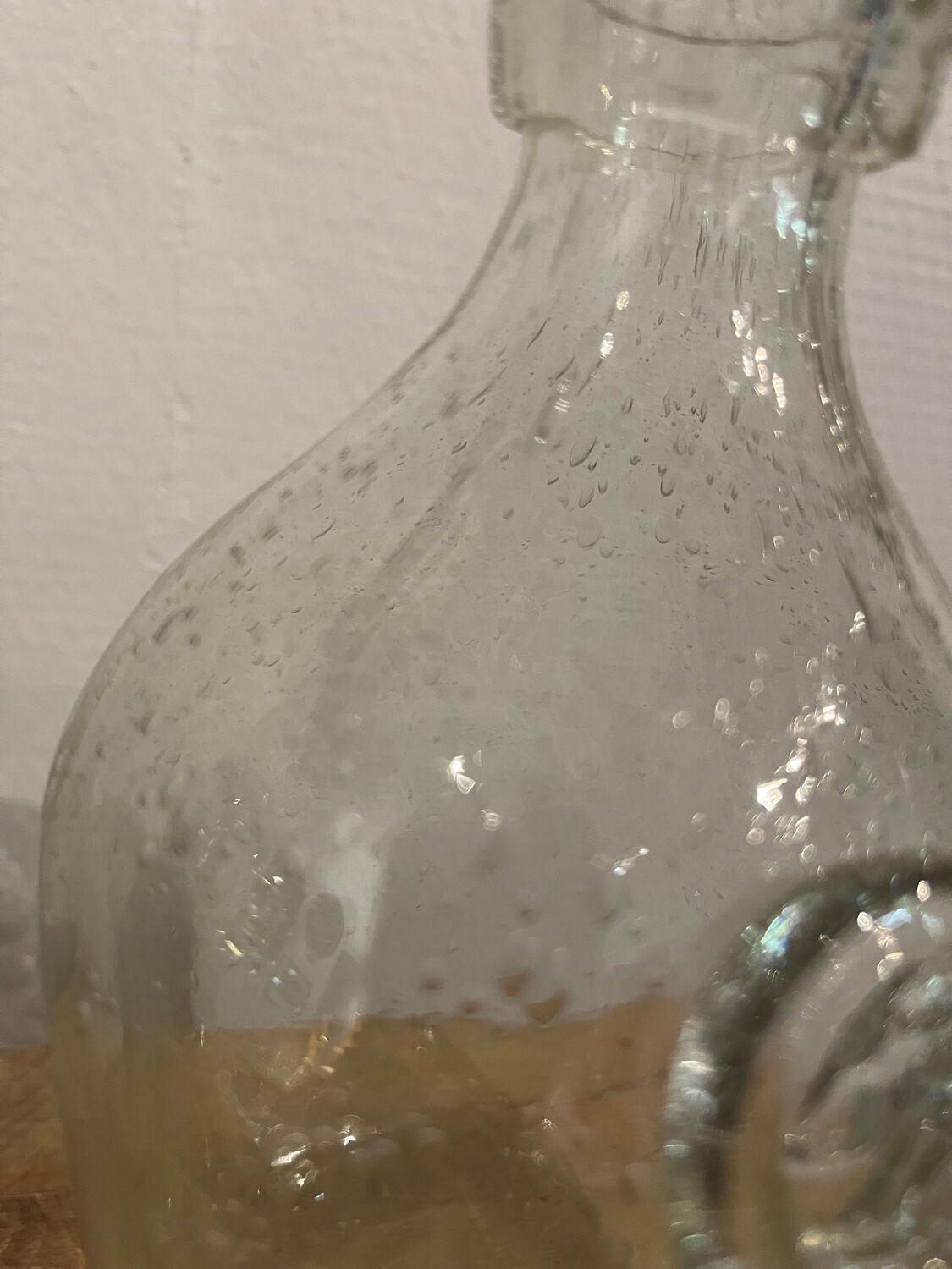 Signed Biot bubble glass bottle