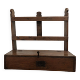 Antique wooden wall shelf that belonged to a religious figure