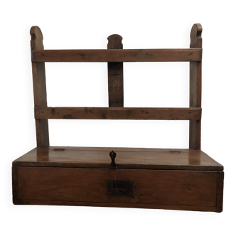 Old wooden wall shelf that belonged to a religious