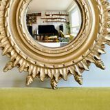 Antique golden witch's eye sun mirror