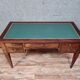 Bureau de centre double face Louis XVI en acajou vers 1850