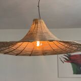 Large lampshade made of woven ropes.