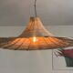 Large lampshade made of woven ropes.