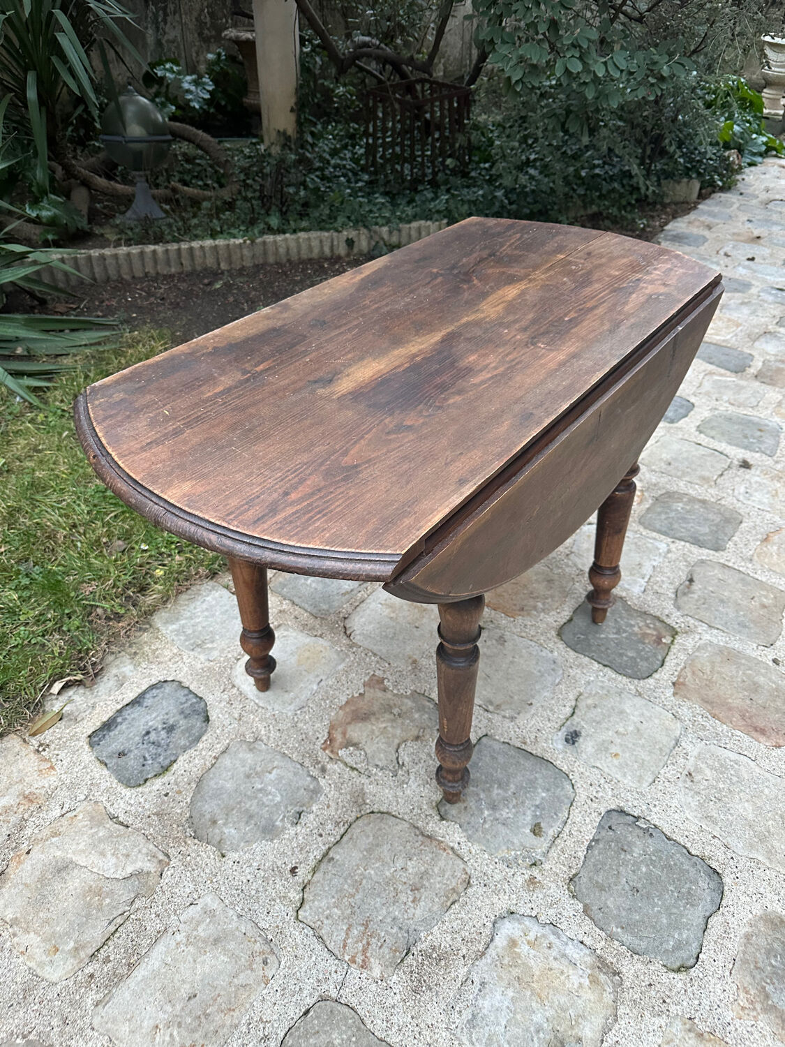Antique table with flaps