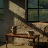 Vintage Indian teak coffee table inlaid with elephant motifs, mid-20th century.