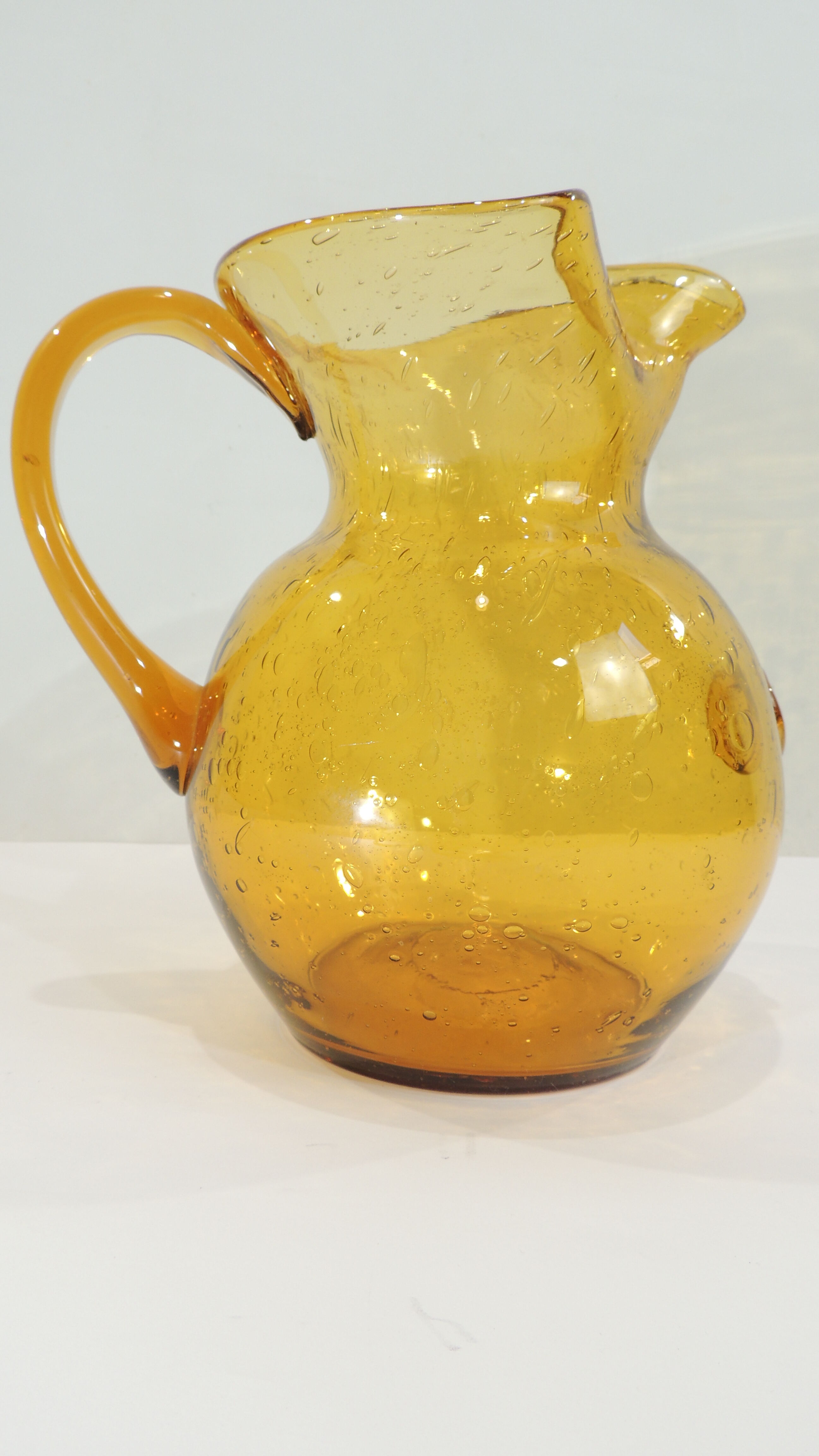 Bubbled glass pitcher biot style from the glassworks La Rochere