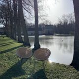 Pair of wicker "basket" armchairs